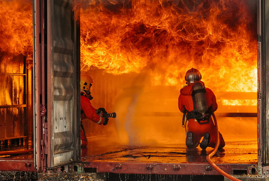 Firefighters fighting a fire,Firefighter training with gas and flame