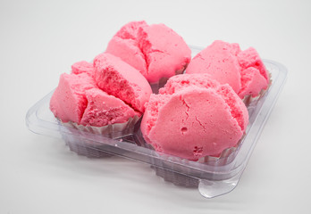 Kanohm Sa Lee, Thai Steamed egg cake in pink color, Thai sponge cake isolated on white
