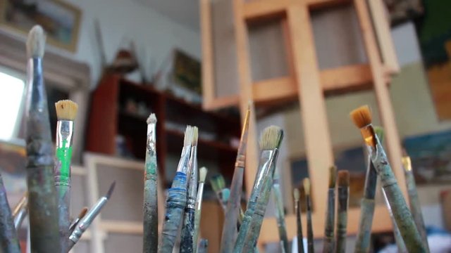 Artist's canvas in artistic studio. Oil paintings in creative workroom