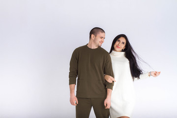 Multiracial group of friends in studio on white background. 
Frenship and wellbeing concept.