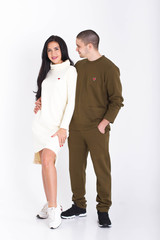 Multiracial group of friends in studio on white background. 
Frenship and wellbeing concept.