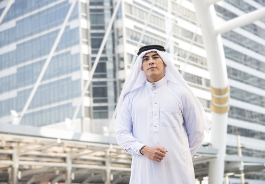 Handsome businessman arabic stand in the city.
