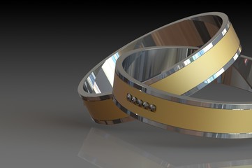 A pair of gold wedding rings with diamonds on black background