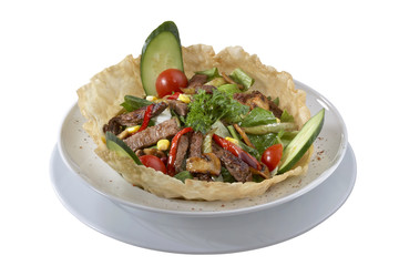 Stewed beef with vegetables isolated on white