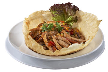 Stewed beef with vegetables isolated on white
