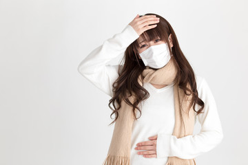 体調不良・女性
