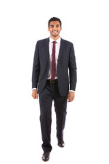 a walking man in a suit