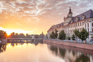 Fototapeta na wymiar Amazing sunset over University of Wrocław