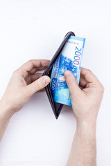 purse with money in hands