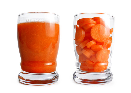 Fresh carrot smoothie in glass isolated on white background. 