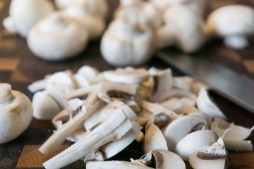 Fototapeta na wymiar Heap of mushrooms: sliced champignons as ingredients for cooking dinner