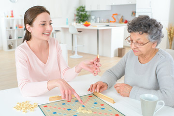 a game of scrabble with an old woman