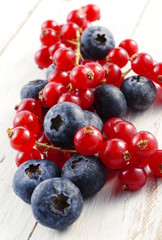 wild berries on white wood