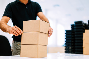 Picture of man boxing products for dispatching