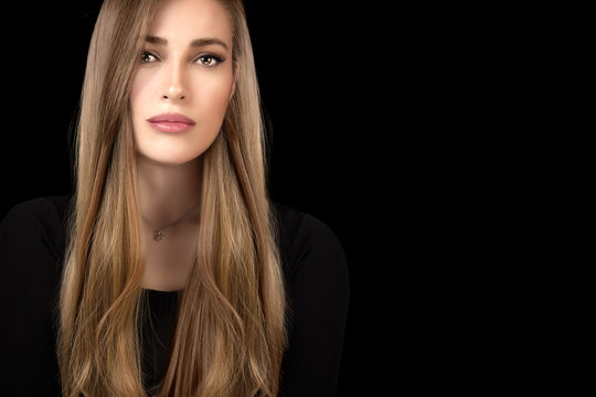 Beautiful model girl with healthy long hair. Hair coloring technique