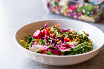 Fresh Homemade Colorful Salad with Purple Cabbage, Beet, Carrot and Rocket