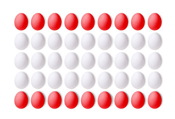 Set of red and white eggs on a white background, laid in a line. 