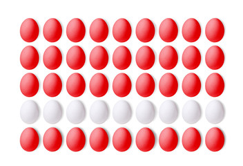 Set of red and white eggs on a white background, laid in a line. 