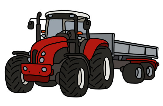 The red heavy tractor with a trailer
