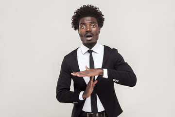 Time out sign. Afro man need break.