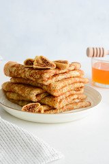 Pancakes with figs and honey.
