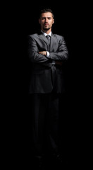 Handsome mature business man isolated on black background