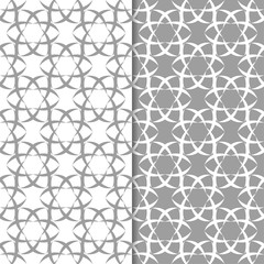 White and gray set of floral seamless patterns