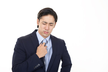 疲れた表情のビジネスマン