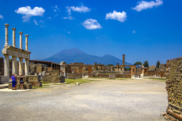 View of the ancient city, the ruined ancient columns and the volcano Vesuvius, Pompeii (Scavi di...