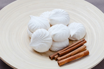 white marshmallow and cinnamon on a plate