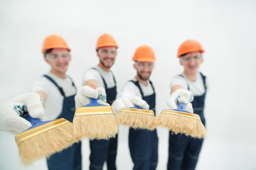 group of builders with different tools