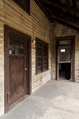 Fototapeta na wymiar Rear Porch with Door & Window - Abandoned Dudley Snowden House - Appalachia Kentucky