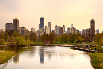 Downtown skyline and South Pond at Lincoln Park in Chicago, Illinois