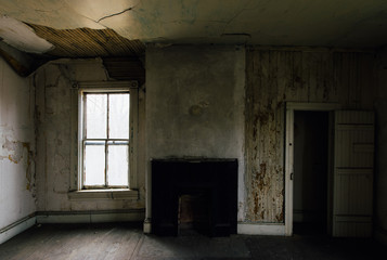 Fototapeta na wymiar Typical Derelict Room with Fireplace - Abandoned Dudley Snowden House - Appalachia Kentucky