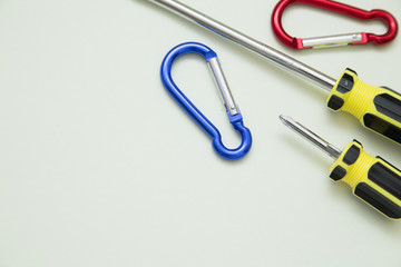 Home, House Repair, Redecorating, Renovating Concept. A set of repair tools on a white grid: two screwdrivers, top view, flat lay