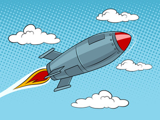 Fototapeta premium Rocket missile flying pop art style vector