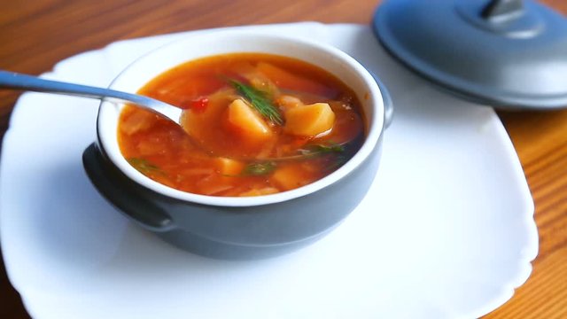fresh hot soup with vegetables and beetroot