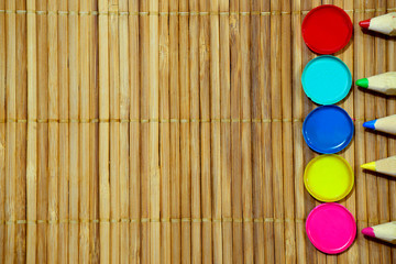 Colored pencils and watercolors.