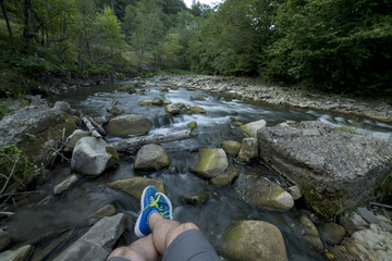 Resting on the rocks, at the river
