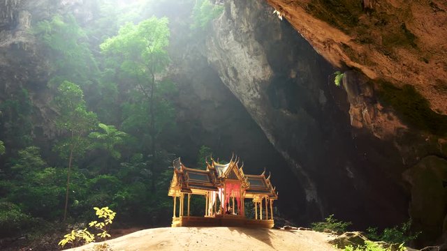 Khuha Kharuehat Pavilion, built for King Chulalongkorn (Rama V) in Phraya Nakhon Cave, symbol of Prachuap Khiri Khan Province, Thailand. Panning shot.