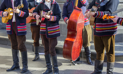 Croatian tamburitza musicians in traditional Croatian folk costumes
