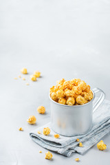 Sweet caramel popcorn for party or cinema at home