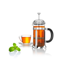 close up view of french press and a cup of black tea on white background