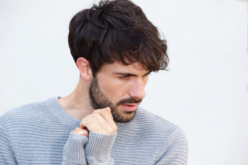 Fototapeta premium Close up sad young man staring