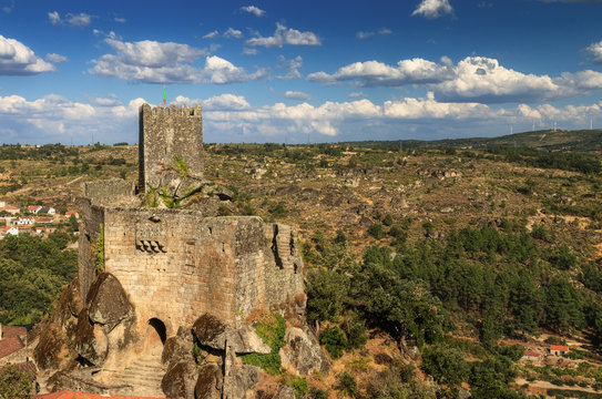 Sortelha castle in Portugal, with clouds in background. - Castelo de Sortelha em Portugal, com n&uacute;vens de pano de fundo.
