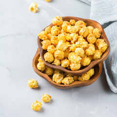 Sweet caramel popcorn for party or cinema at home