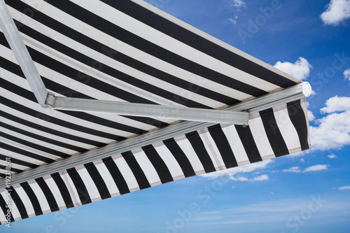 “black and white striped awning isolate on white background” Stock