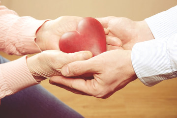 Senior female gesture language, hands signs isolated on solid white background. Old female in her seventies / eighties showing arms forearms.