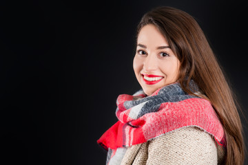 Pretty girl in warm winter clothes