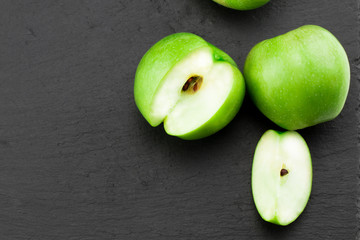 Green apples  on stone table. Top view with copy space